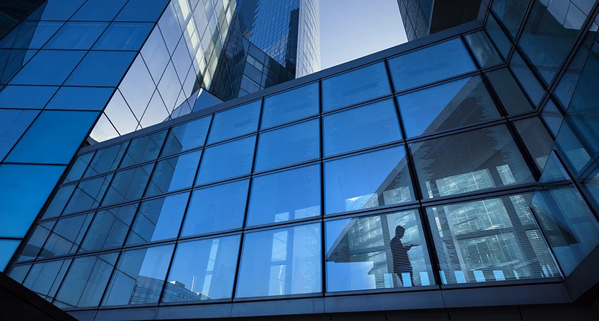 Modern Office Building with Reflective Commercial Glass and Doors